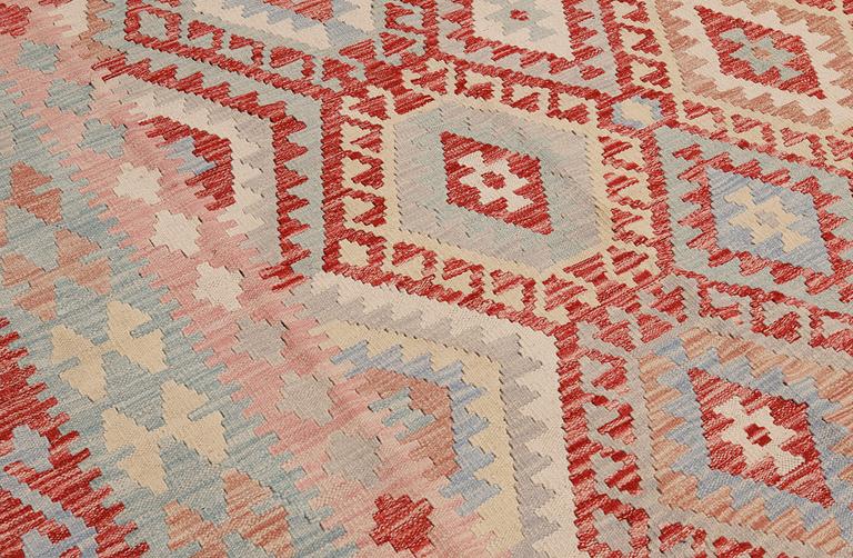 A Kilim carpet, approx. 338 x 265 cm.