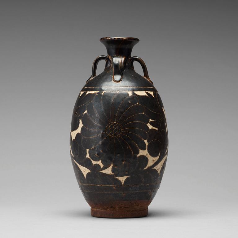 A black-glazed sgraffito vase, presumably Yuan Dynasty.