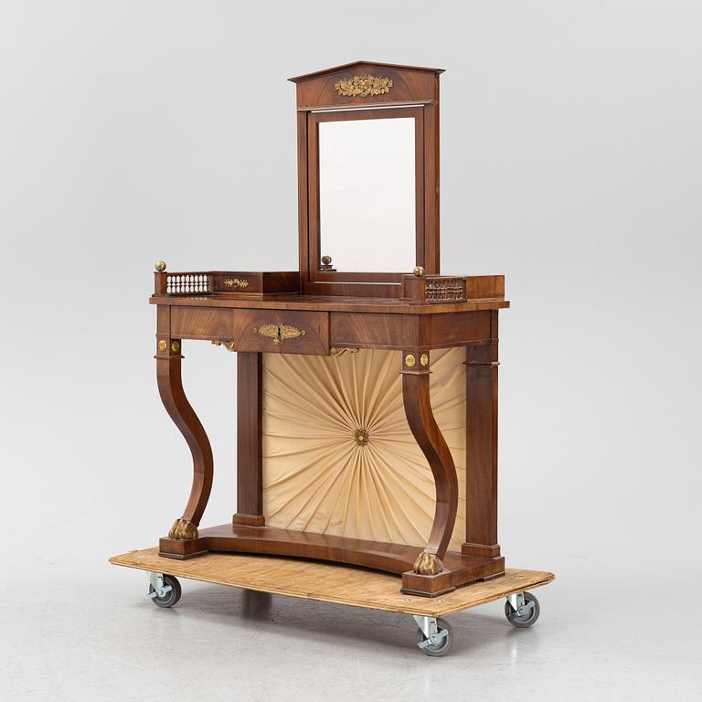 An Empire style dressing table by Johan Öman, Stockholm (1815-33), dated 1827.