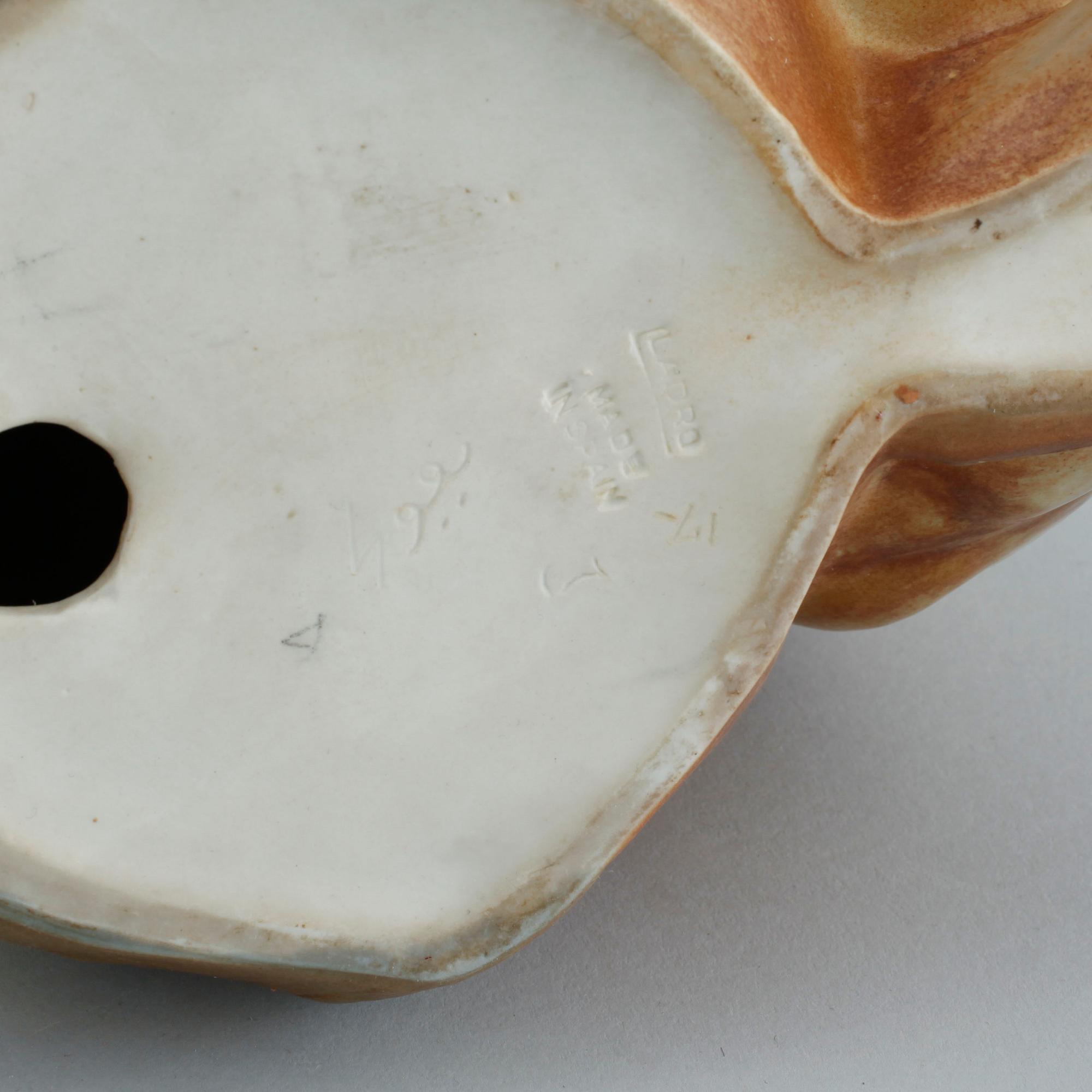 A pair of 1960/70s Lladro figurines.