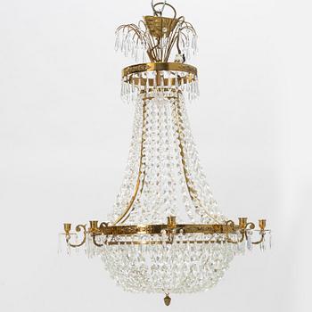 A contemporary Empirestyle chandelier for eight candles.