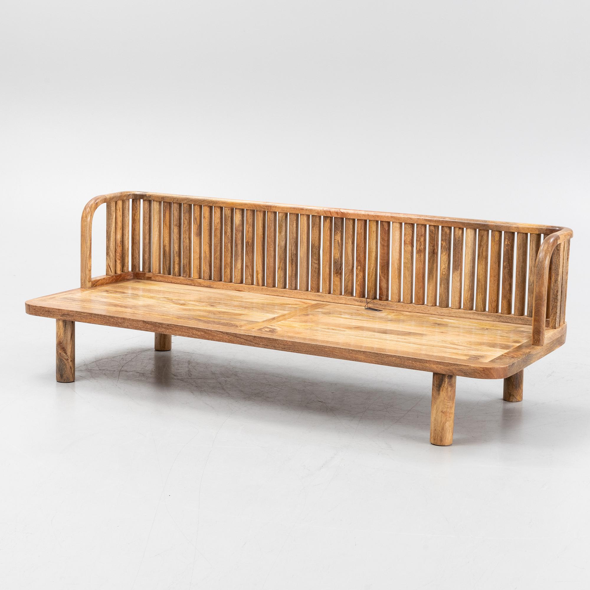 A 'Morena' mango wood  daybed from House Doctor.