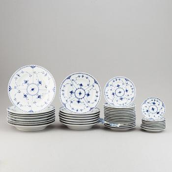 A 92 pcs half lace porcelain dinner-and coffee service, "Musselmalet" from Royal Copenhagen.