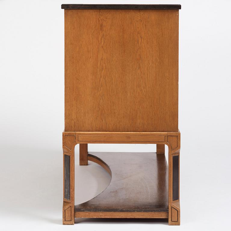 Carl Bergsten, an oak veneered sideboard/ chest of drawers, Nordiska Kompaniet Sweden 1923. Part of a set exhibited in Gothenburg 1923.