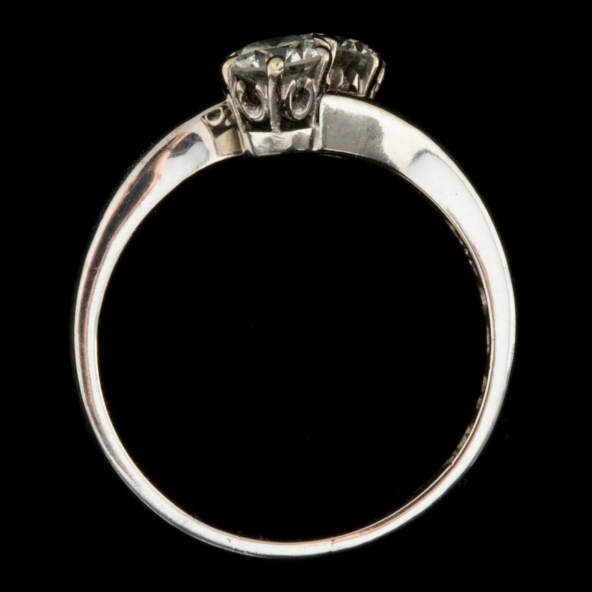 RING, 18 k vitguld med 2 briljantslipade diamanter, totalt 0,75ct, Stockholm, 1954. Vikt ca 2 g.