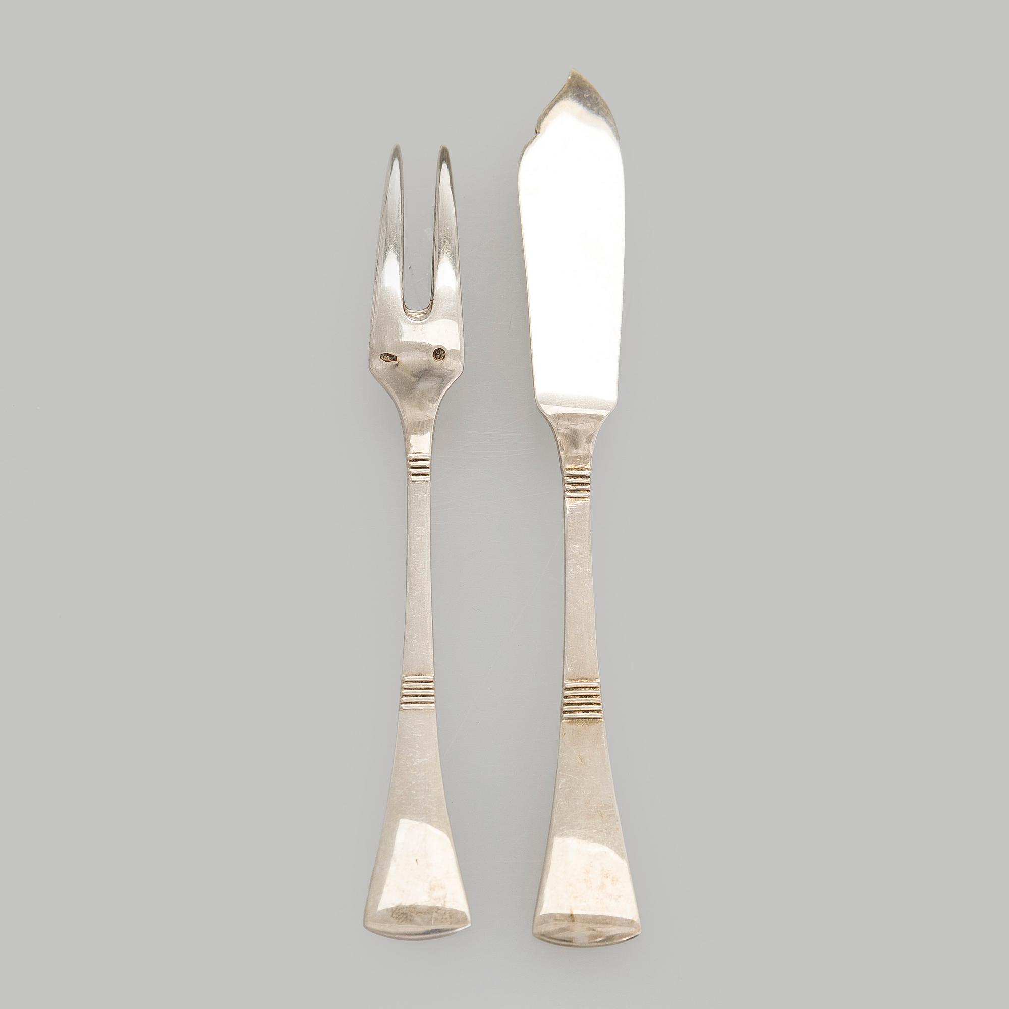 Serving platter, silver, Czechoslovakia, and twelve serving utensils, Alexander Sturm, Austria-Hungary, 1867-1941.