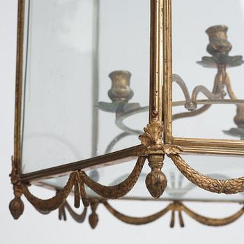 A Swedish rococo gilt-brass four-light lantern, possibly a masterpiece, Stockholm, later part of the 18th century.