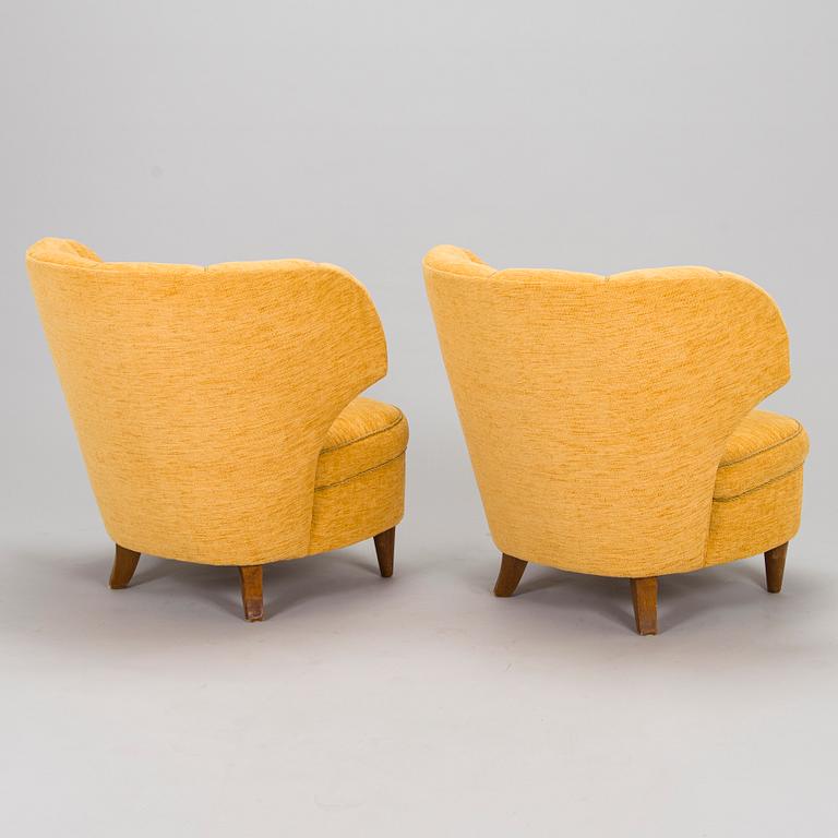 A pair of armchairs, mid-20th century.