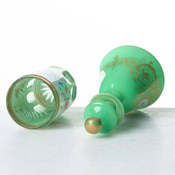A green bottle with stopper and a beaker glass, Russia, 19th Century.