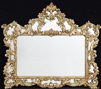 An mid 20th century Louis XV-style mirror from Paoletti, Firenze Italy.