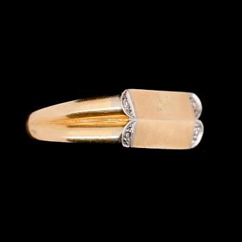 RING, 18 k guld och vitguld, med 4 briljantslipade diamanter. Total vikt 9 g.