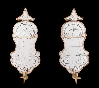 725. A pair of Swedish Rococo 18th century one-light girandole mirrors.