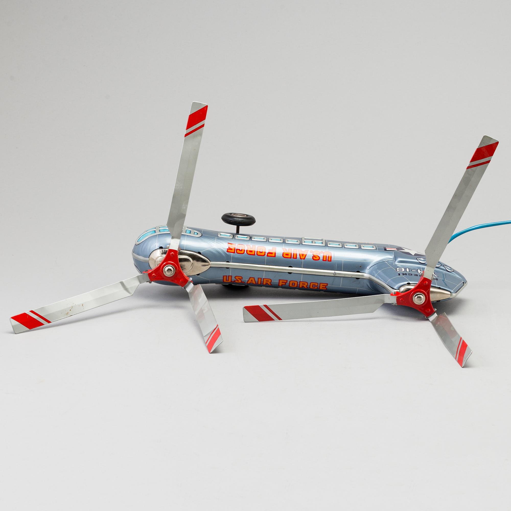 A toy metal car "Sunday Driver", Kosuge, Japan, and "Giant Helicopter", YF, Japan. 1960s.