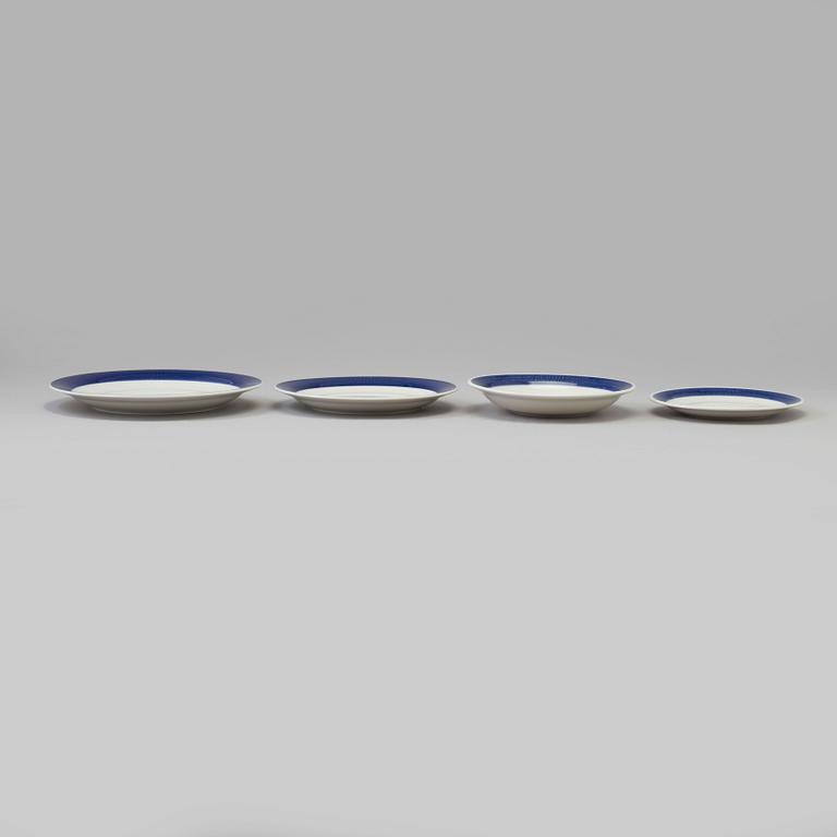 a 51 pcs porcelin dinner service, 'Koka blå', by Hertha Bengtsson, Rörstrand, in production 1956-1988.