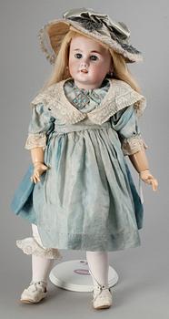 A German/French bisquit doll, marked DEP, around 1900.
