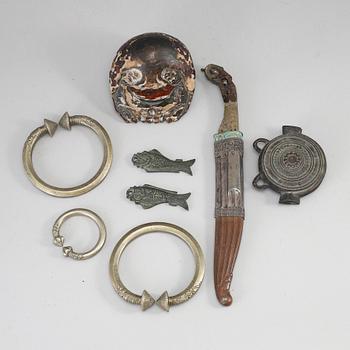 A group of decorative objects, wood and metal, circa 1900.