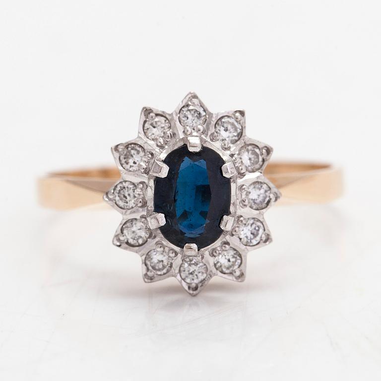 Ring, 14K guld med safir och diamanter tot. ca 0,12 ct. Kultakeskus, Tavastehus, 1994.