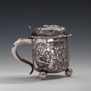 A TANKARD silver. Germany 1800 s. Height 13 cm. Weight 414 g.