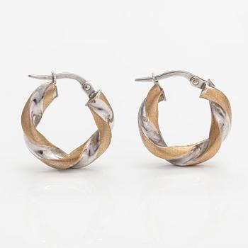 A pair of 14K white and yellow gold earrings. Unoaerre, Italy.