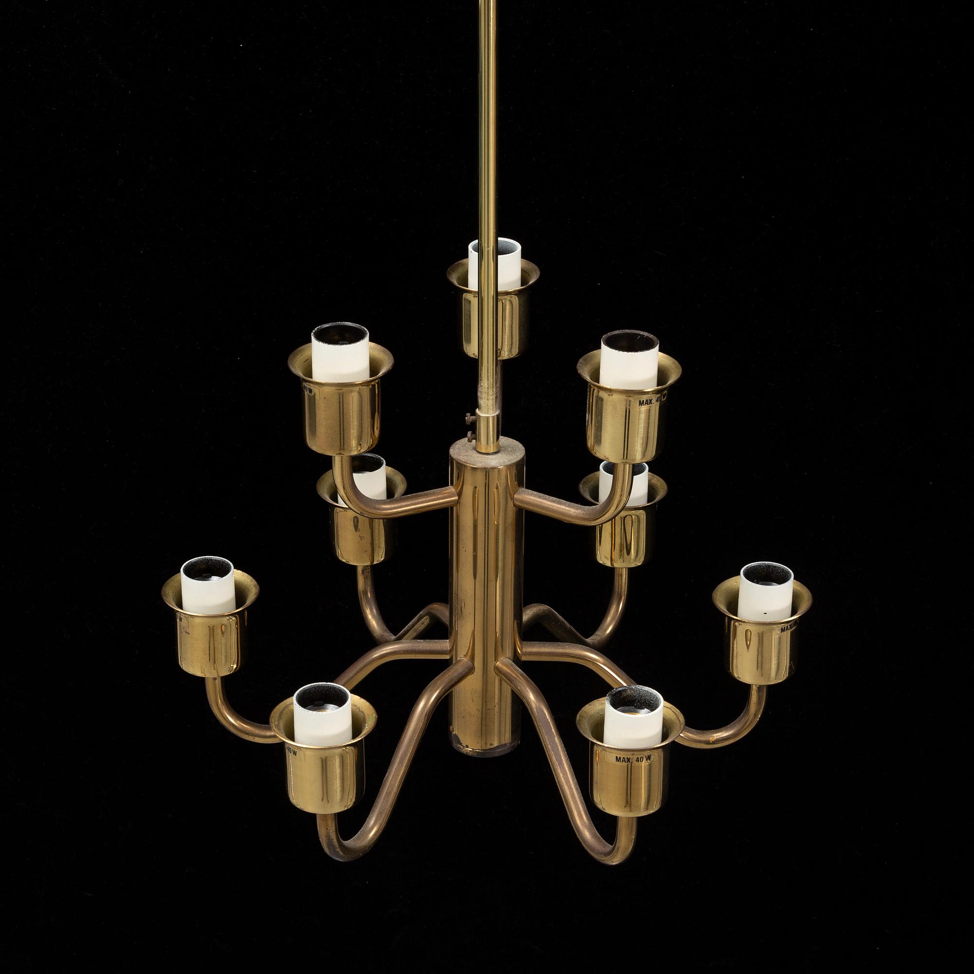 Hans-Agne Jakobsson, a late 20th century brass and glass ceiling lamp for nine lights, Markaryd, Sweden.