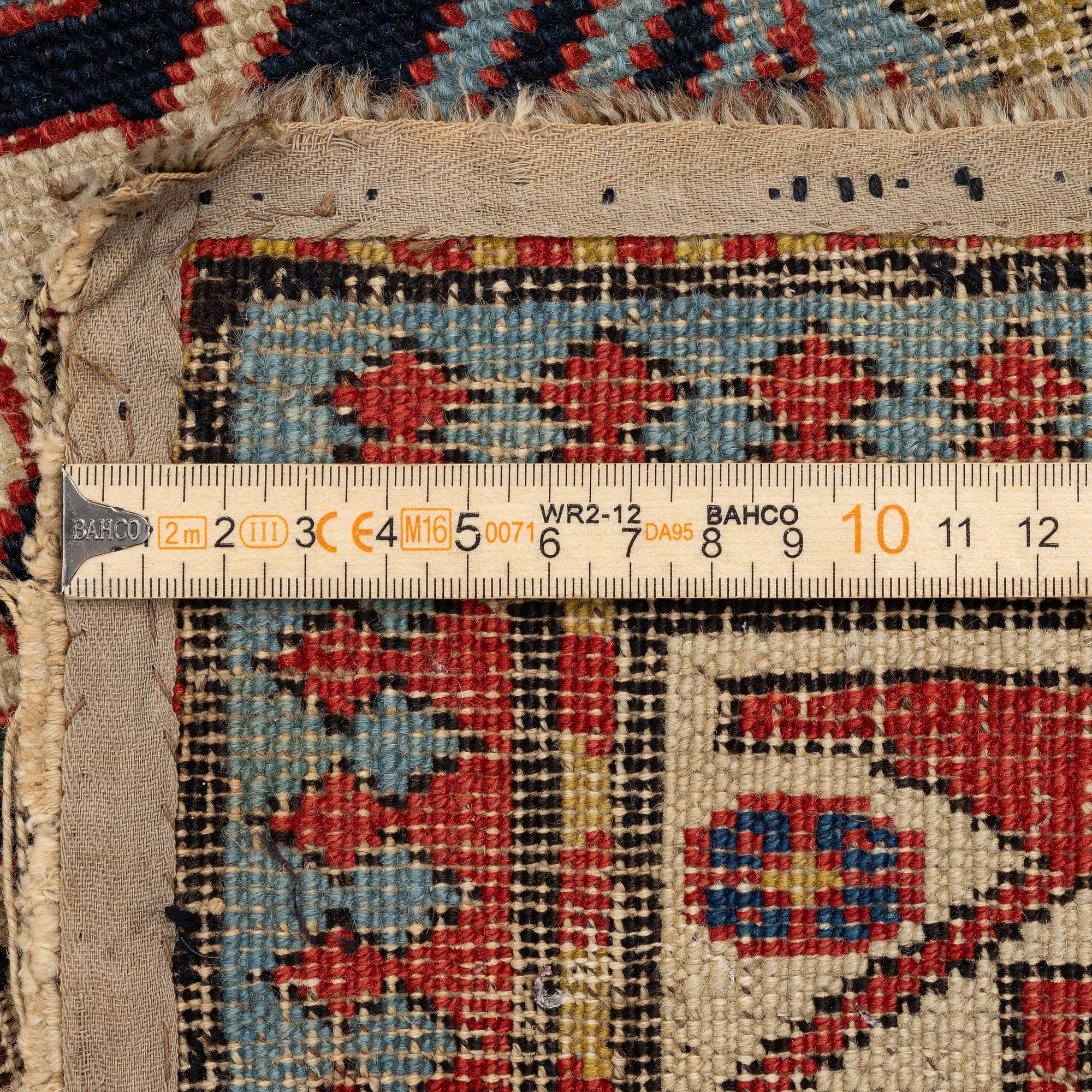 An antique Kuba prayer rug East Caucasus, c. 192 x 119 cm.