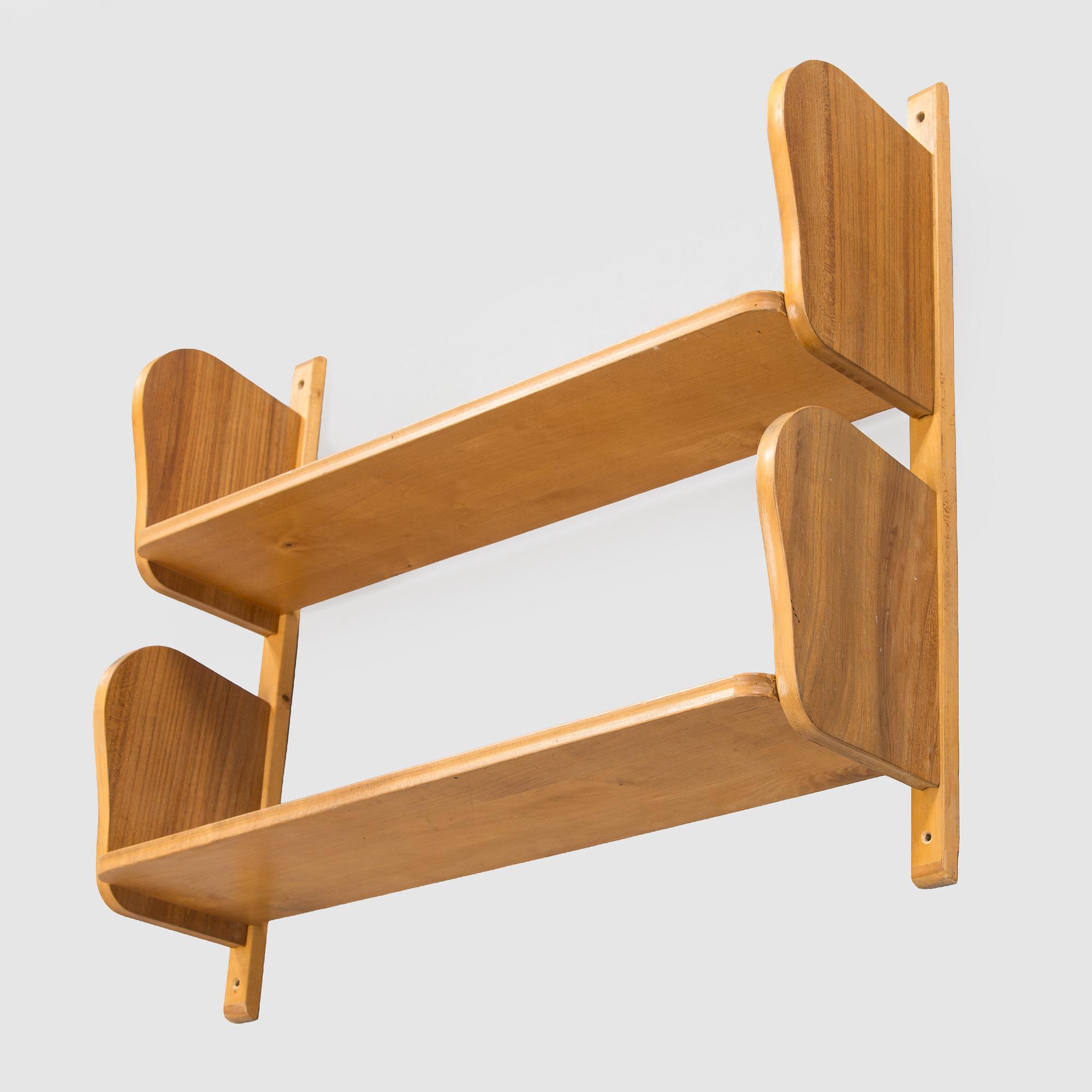 A mid-20th century 'Poika' wall shelf by HMN Huonekaluliike Mikko Nupponen.