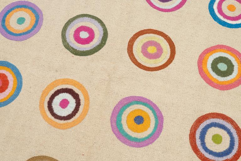 A hand-embroidered kilim rug, c. 183 x 125 cm.