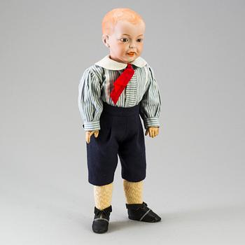 A bisque head character doll marked 226, probably France, 1910s.