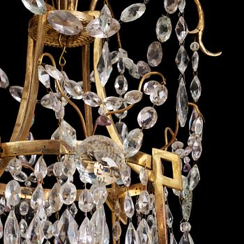 A German Louis XVI ormolu and cut-glass nine-light chandelier attributed to Johann Christoph Ermisch, late 18th century.