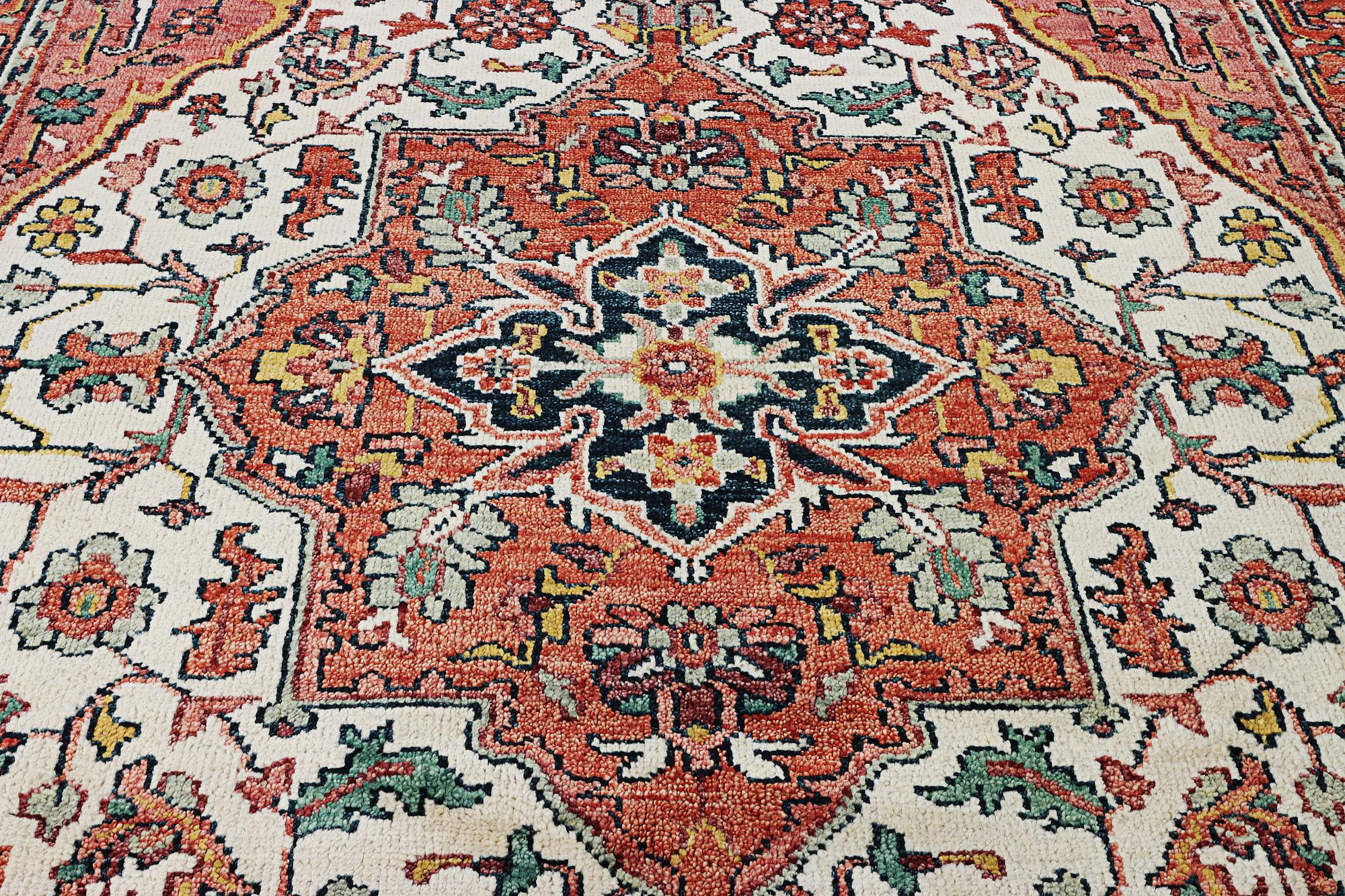 An oriental carpet with Mamluk design, c. 367 x 280 cm.