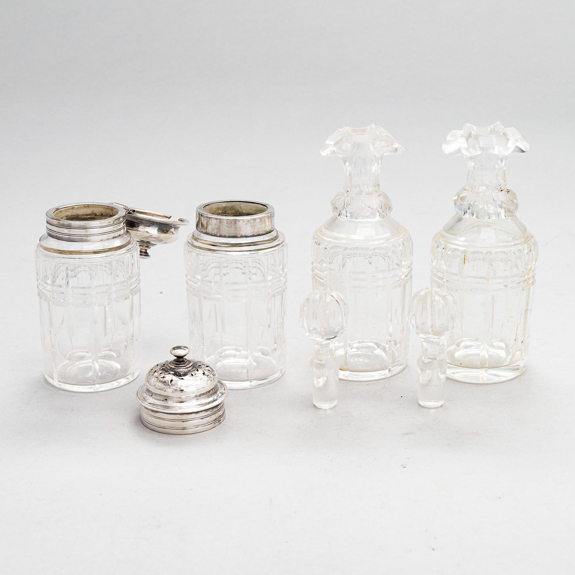 Glass and sterling silver cruet stand, maker's marks of Samuel Hennell and Robert Hennell III, London 1811 and 1879.