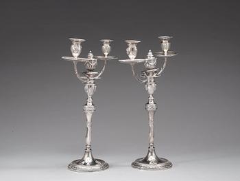 A pair of English 18th century silver candelabras, marks of Henry Hobdell, London 1778.