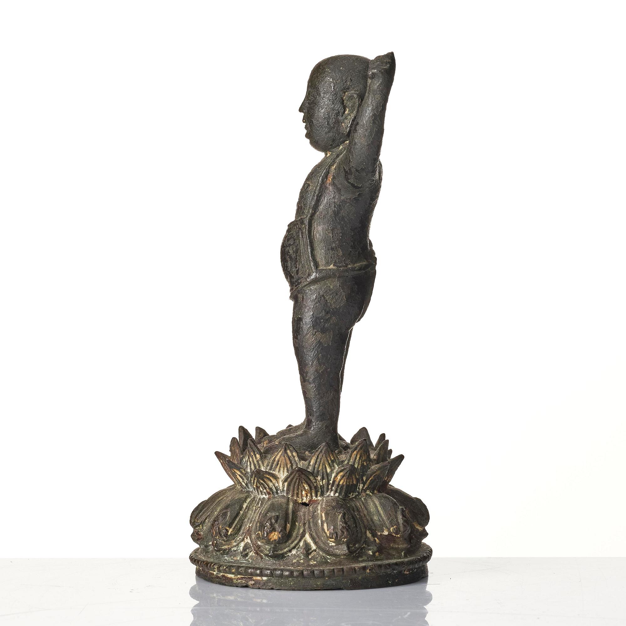 A bronze sculpture of buddha as a child, Ming dynasty (1368-1644).