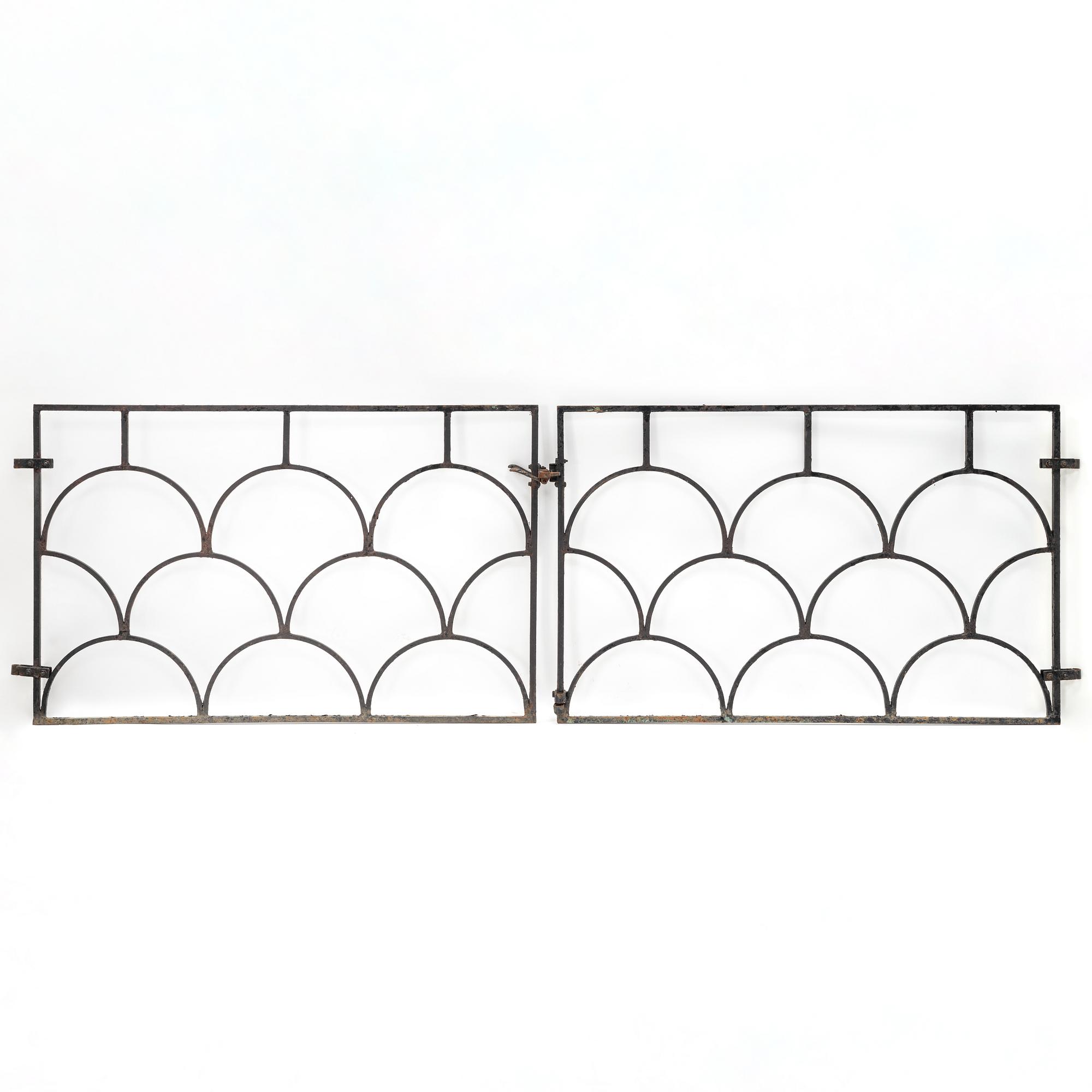 A pair of cast iron gates, 1930's.