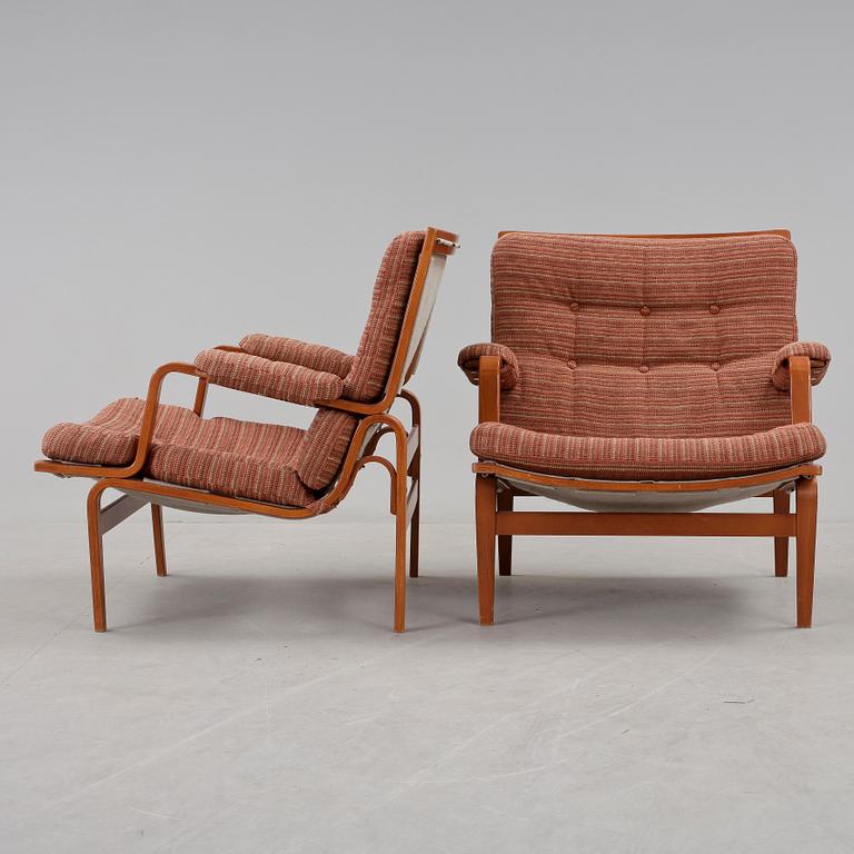 FÅTÖLJER, ett par, "Ingrid", Bruno Mathsson för Dux, 1900-talets slut.