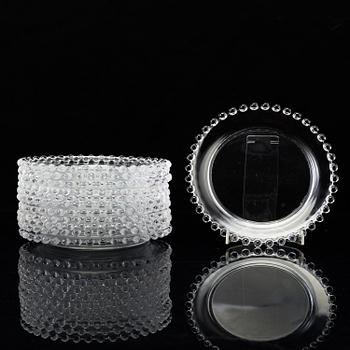 A set of twelve glass small plates by Lalique, France.