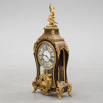 A French Boulle style mantel clock, 19th century.