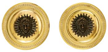 1020. A pair of Empire bronzes for curtain rods.