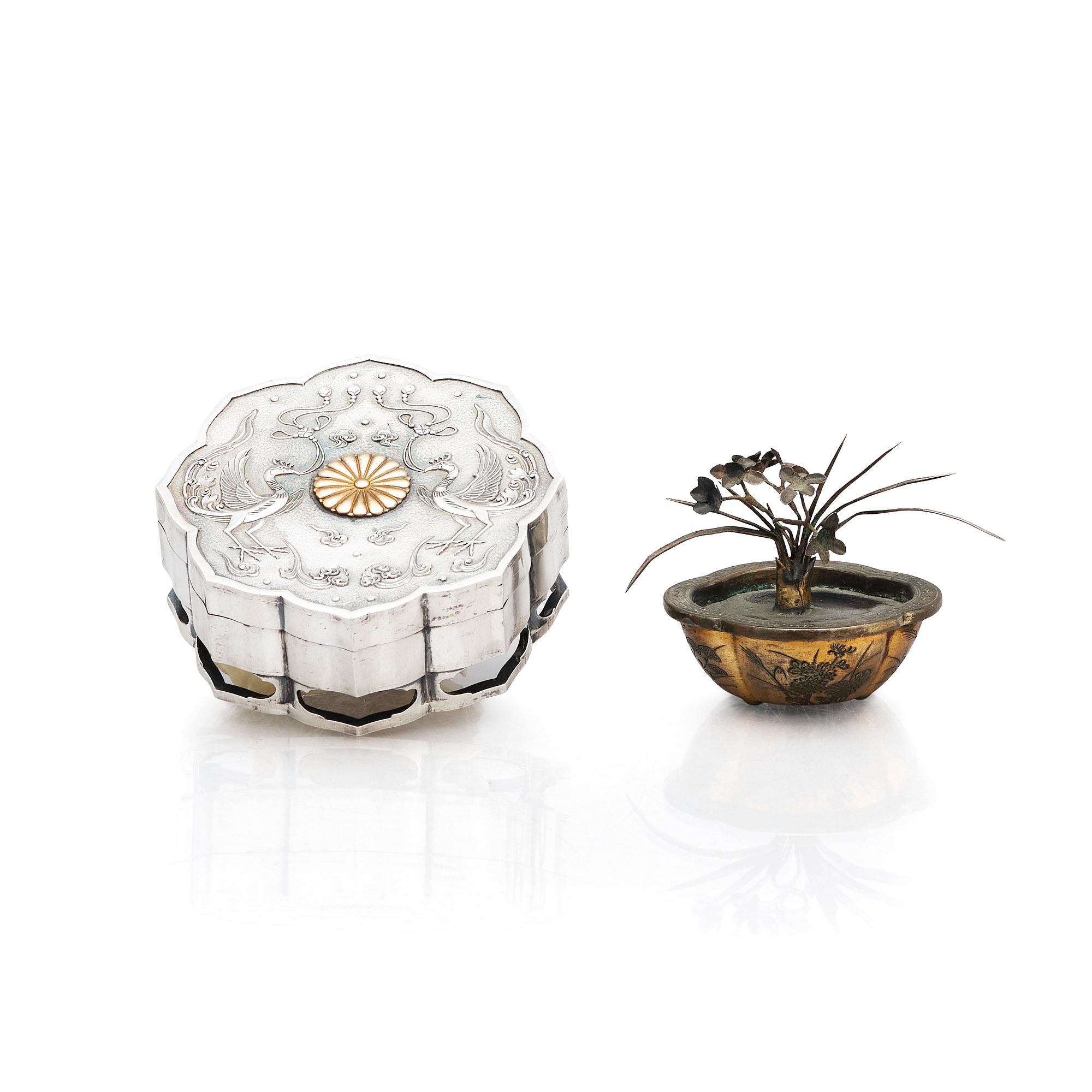 A Japanese silver box and a metal miniature tree, Meiji period (1868-1912).