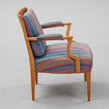 Josef Frank, a mahogany model 969 armchair from Svenskt Tenn.