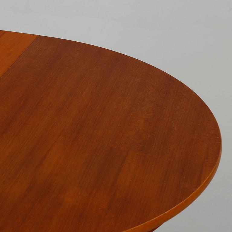 A dining table made in the middle of the 20th century.