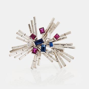 967. A WA Bolin brooch in 18K white gold set with baguette-cut diamonds, sapphires and rubies.