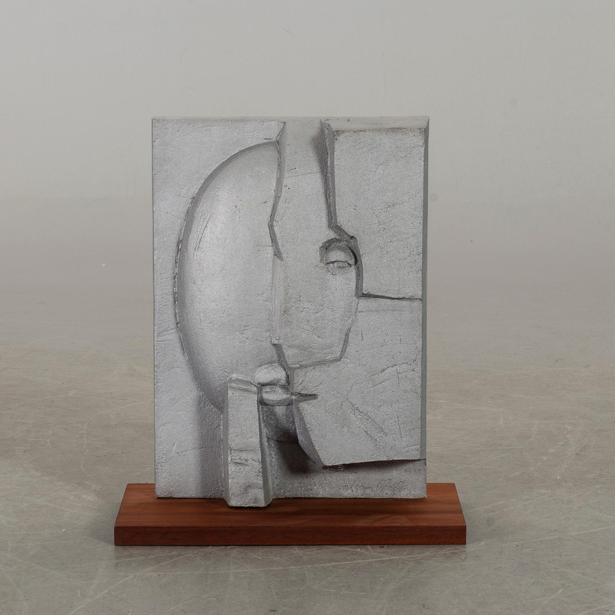 ANN WOLFF,