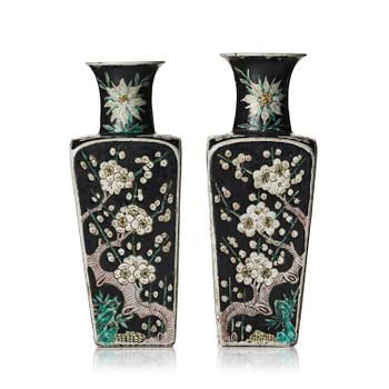 961. A pair of famille noire vases, late Qing, c. 1900.