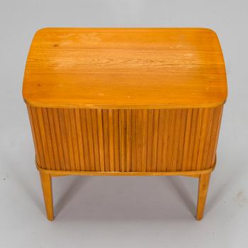 A mid-20th century radio cabinet.