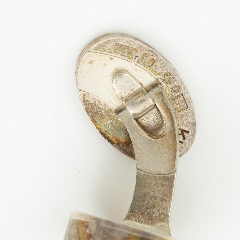 Four pairs of cufflinks, silver, including those by Anders Högberg and Cecilia Johansson.