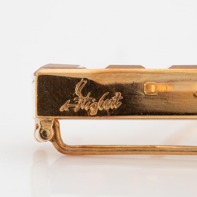 Brooch, Stigbert, Engelbert, 18K gold with synthetic white stones.