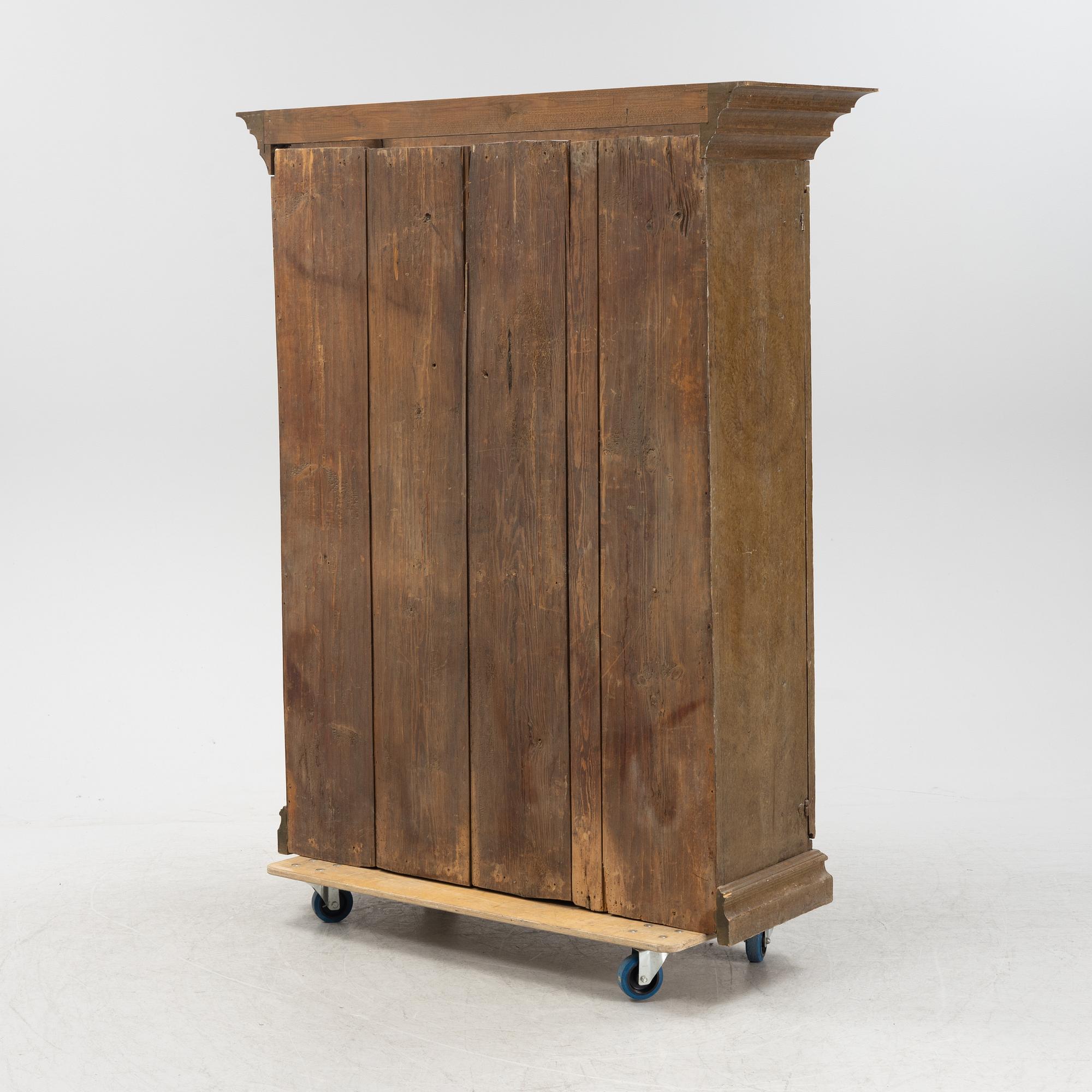 A painted 18th century cabinet.