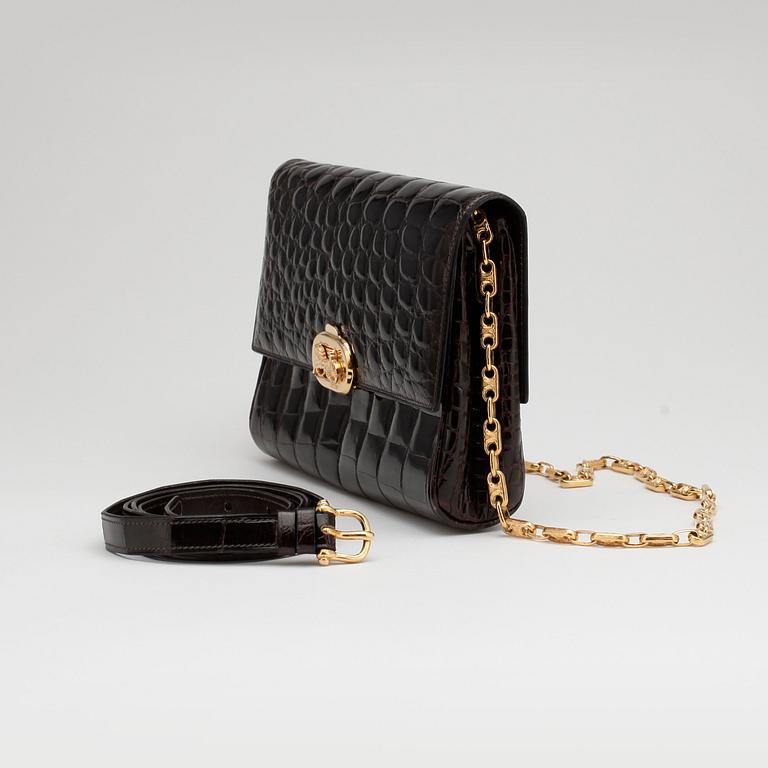 CÉLINE, a brown crocodile evening bag / shoulder bag with  shoulder strap.