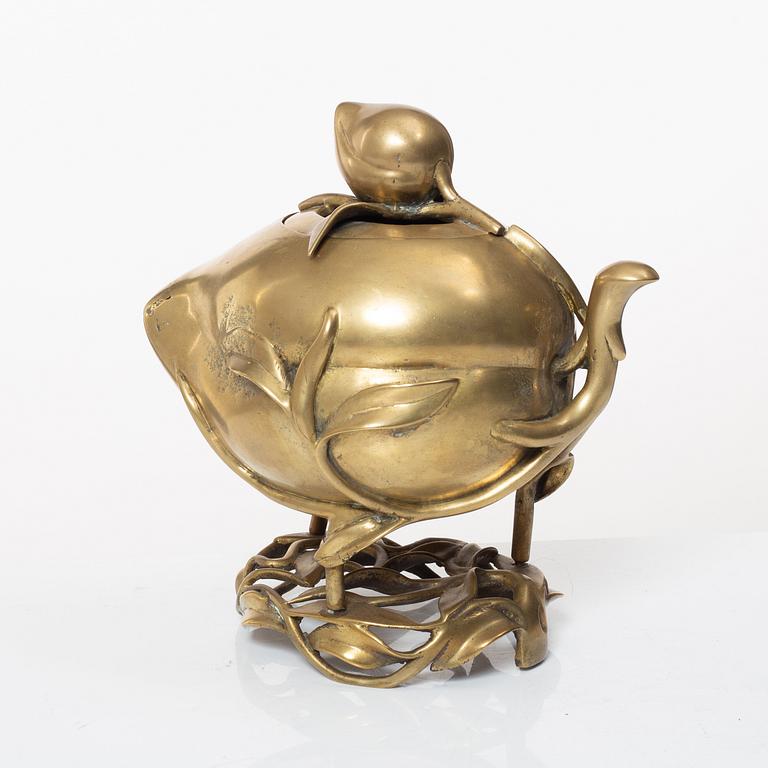 A Chinese brass 'peach' censer, first part of of the 20th century.